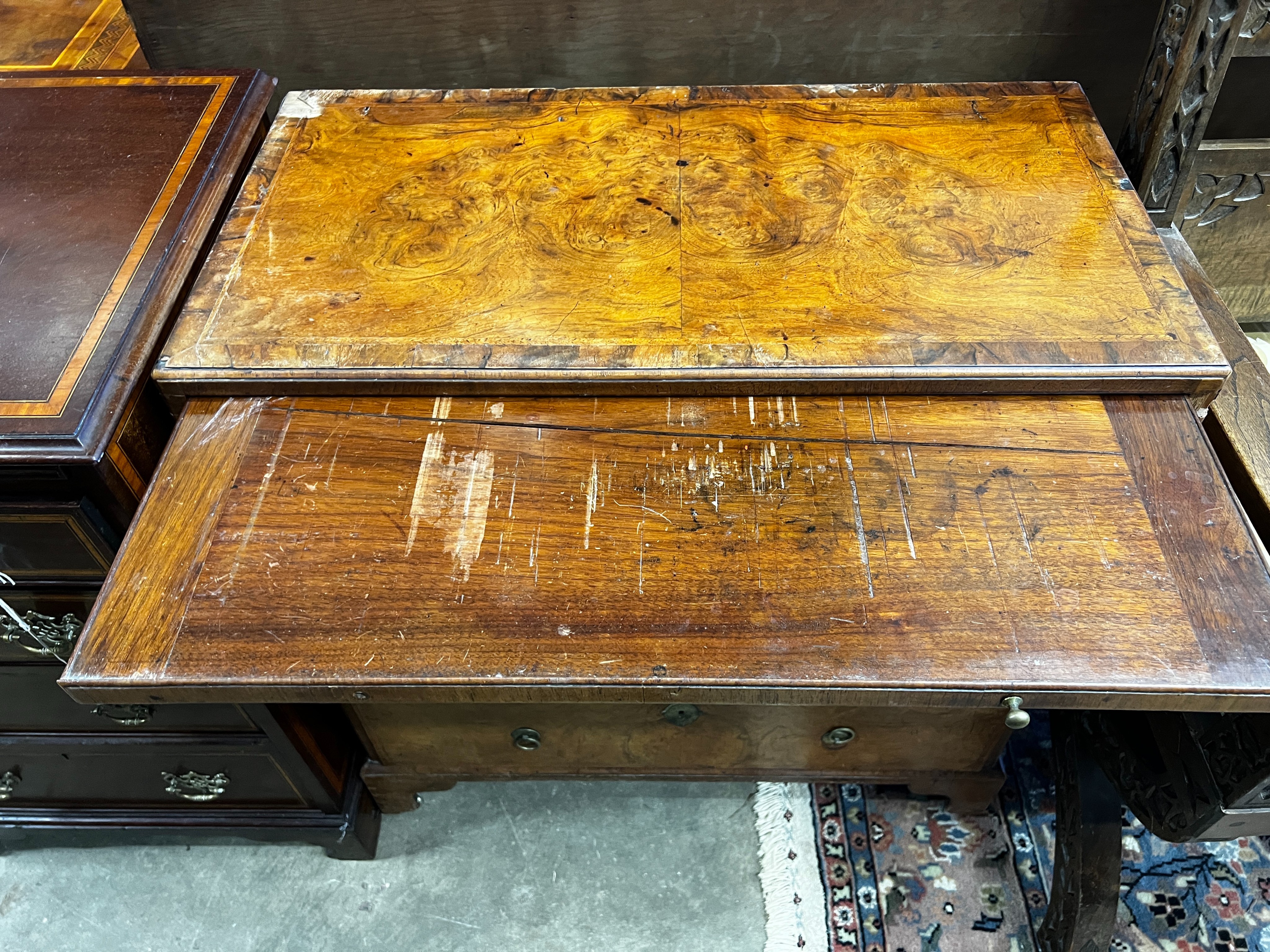 An 18th century feather banded figured walnut five drawer chest fitted slide, width 76cm, depth 40cm, height 87cm